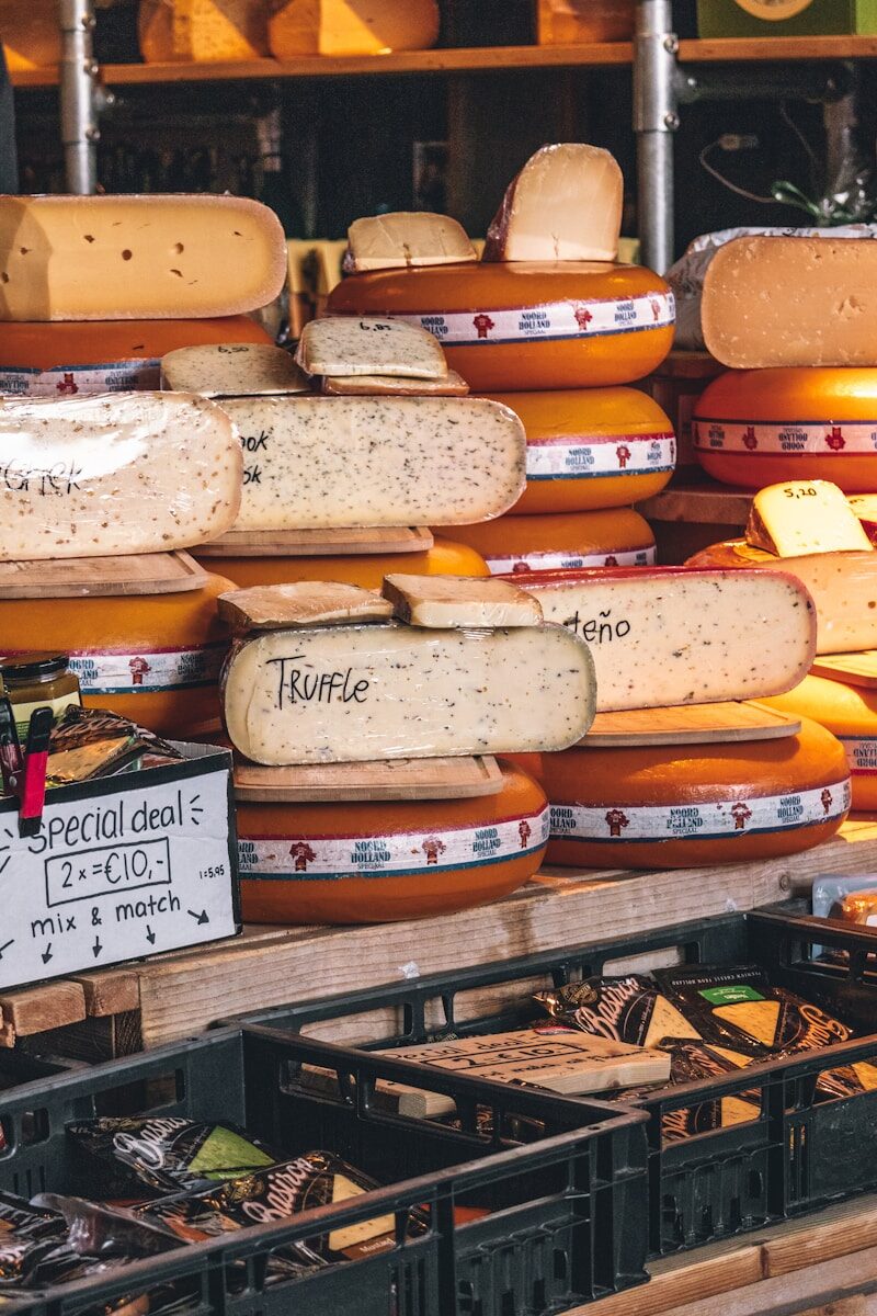 Various types of cheese are for sale.